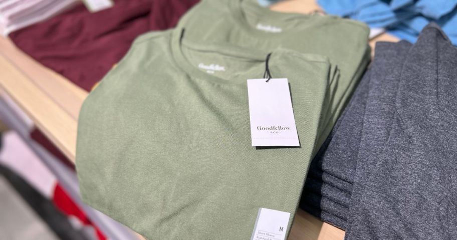 shirts on shelf at store