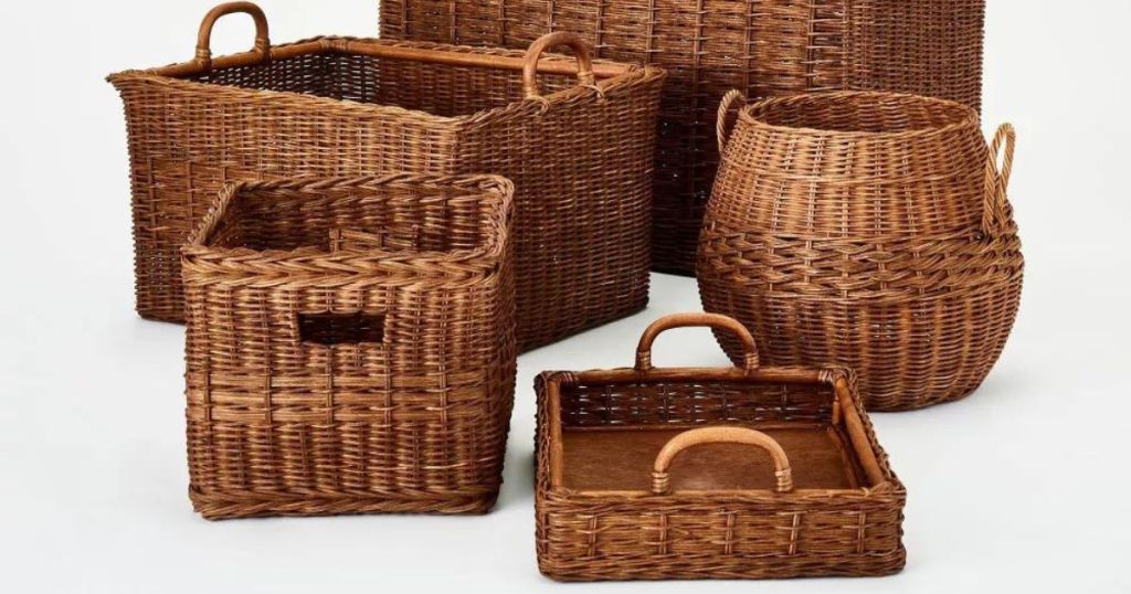 different sized and shaped woven baskets sitting on floor next to each other