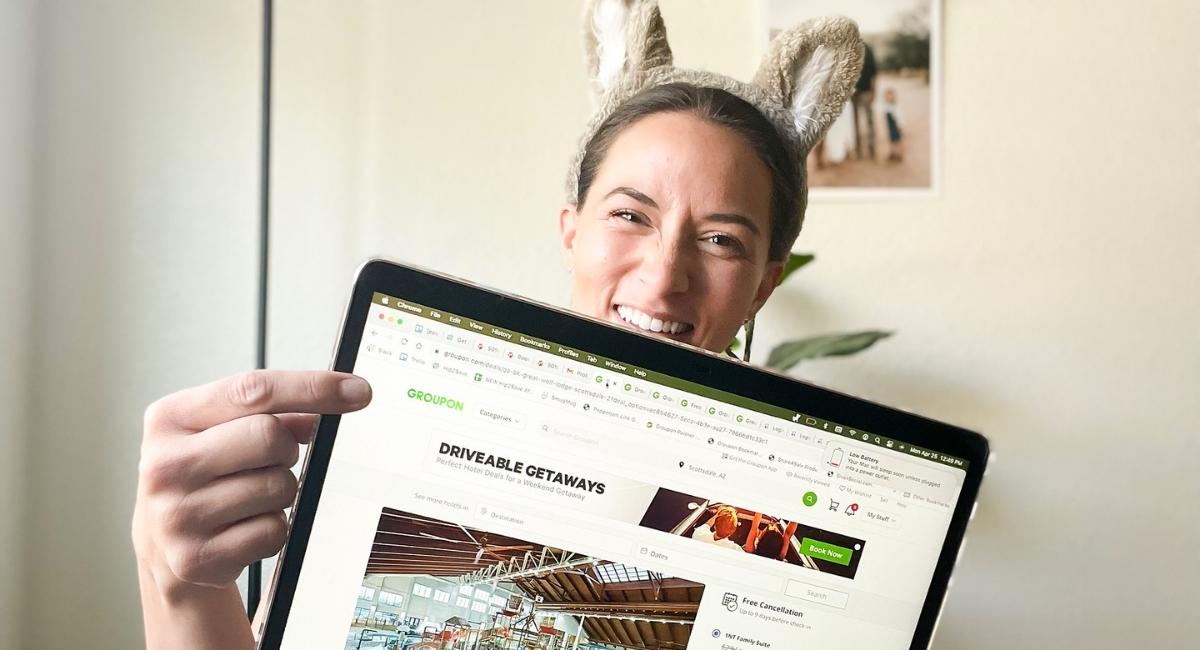 woman pointing to laptop screen