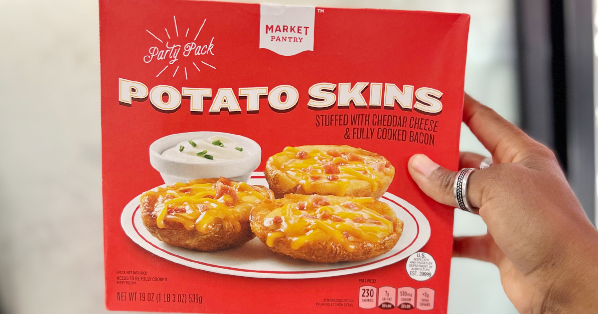 hand holding up a box of target market pantry snacks