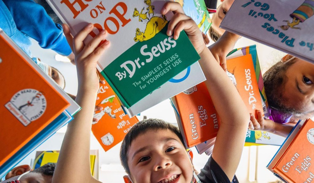 Kids holding Dr. Seuss Books