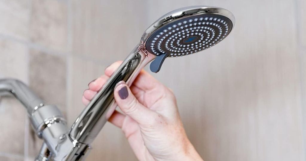 hand holding shower head