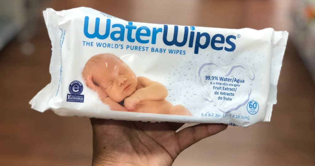 hand holding waterwipes package