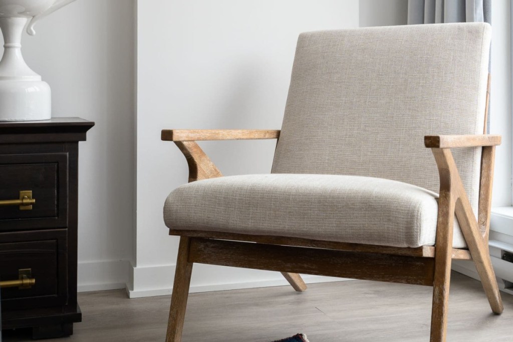 khaki and wood armchair