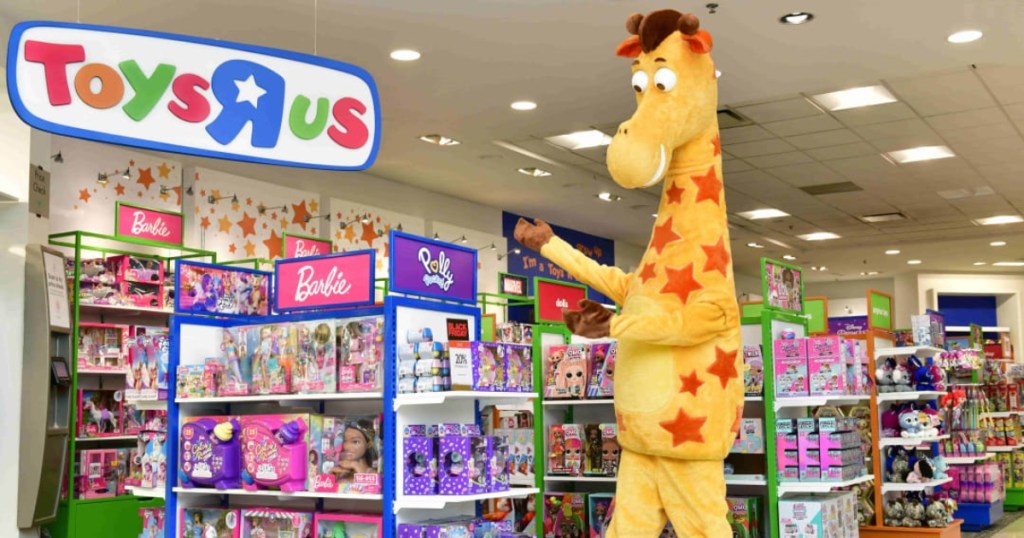 large plush giraffe inside toy store