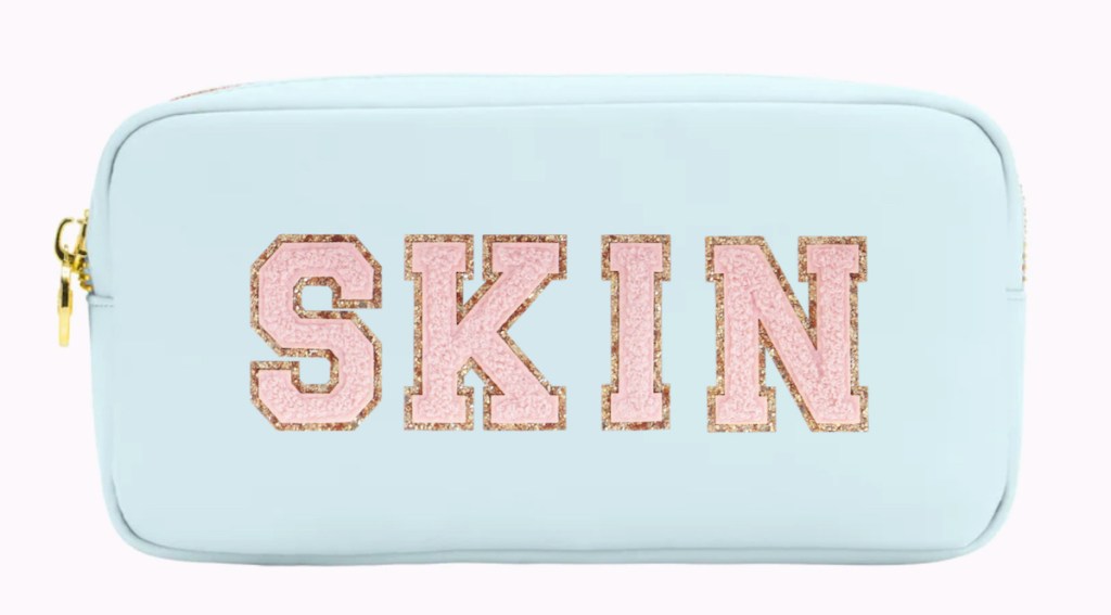 blue and pink skin pouch bag