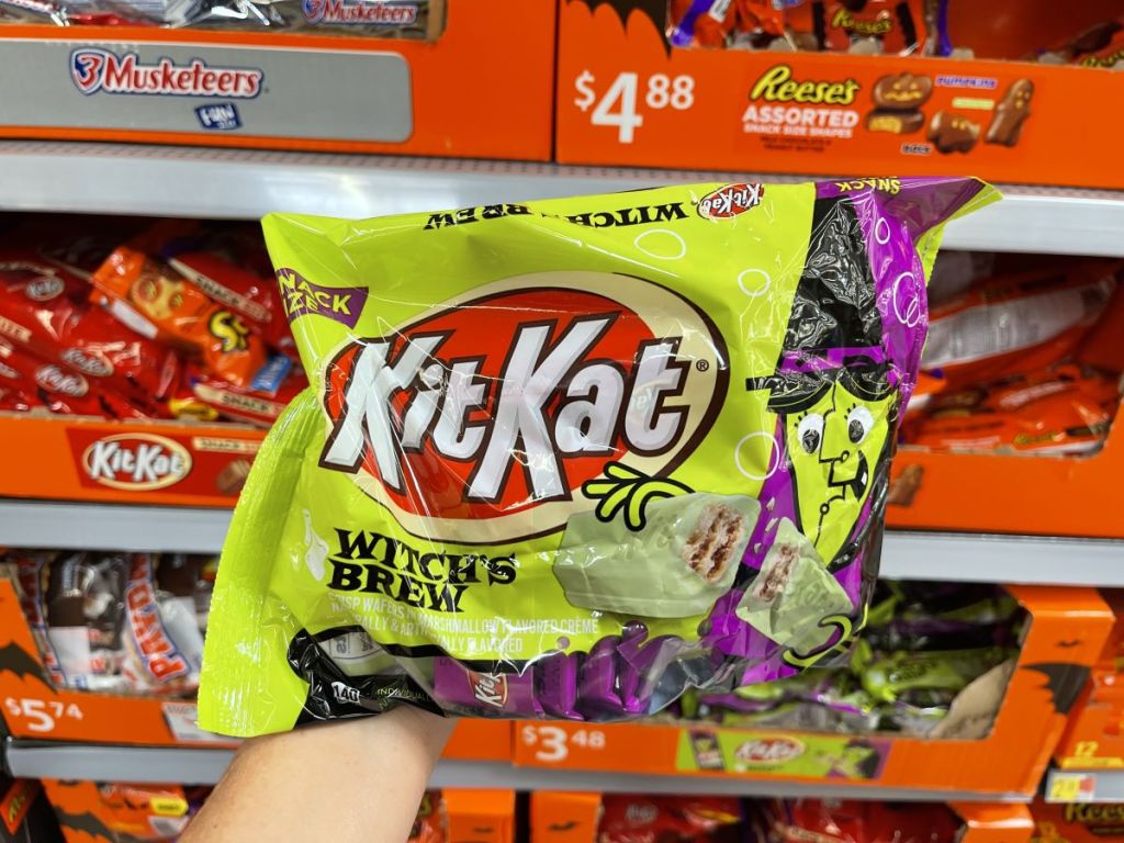 hand holding a bag of Kit Kat Witch's Brew