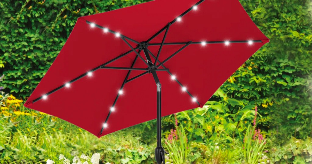 red patio umbrella with lights