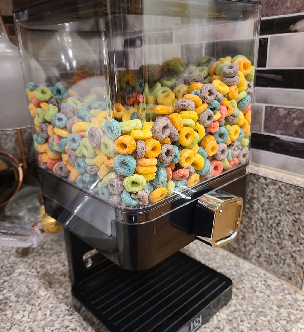 cereal in a black food dispenser