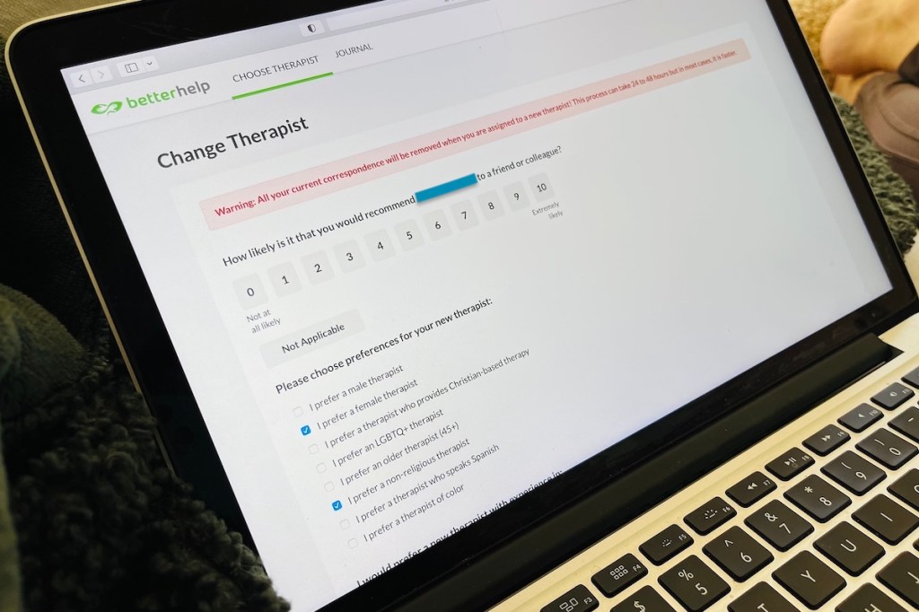laptop screen with therapist change on screen from betterhelp promo code