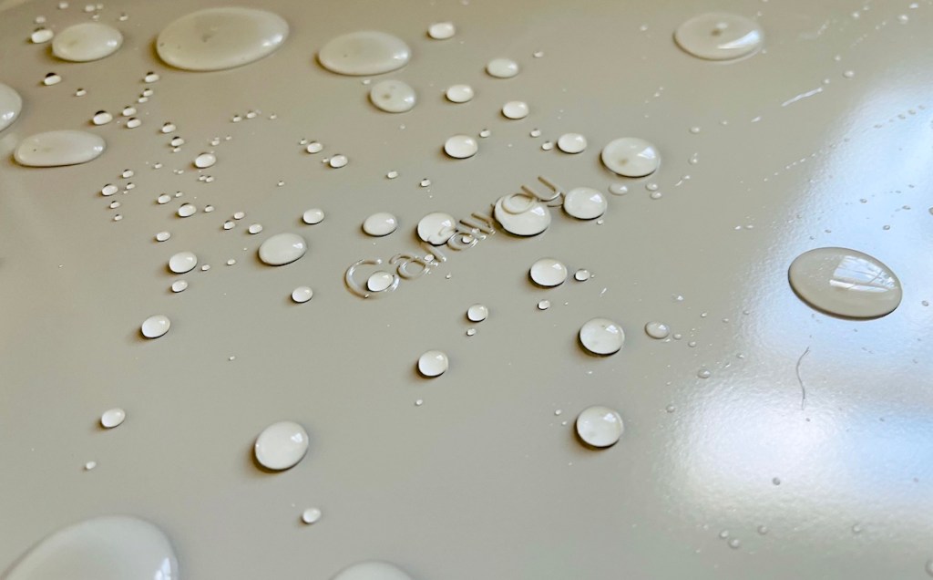 non stick sheet pan with water droplets on top