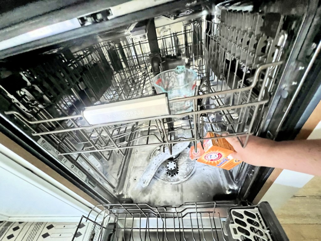 cleaning a dishwasher with vinegar and baking soda