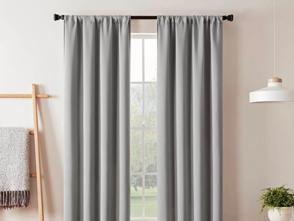 gray window curtain hanging at window