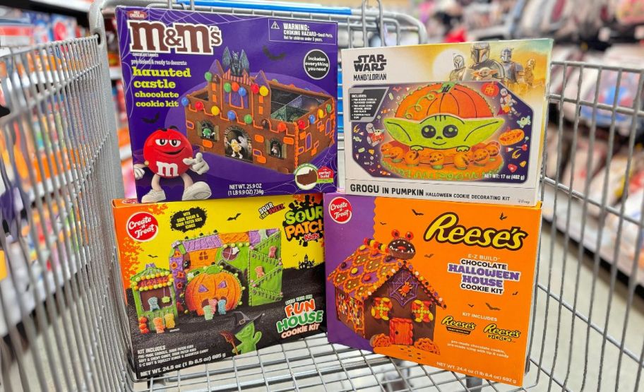 four Halloween theme cookie decorating and building kits in a shopping cart