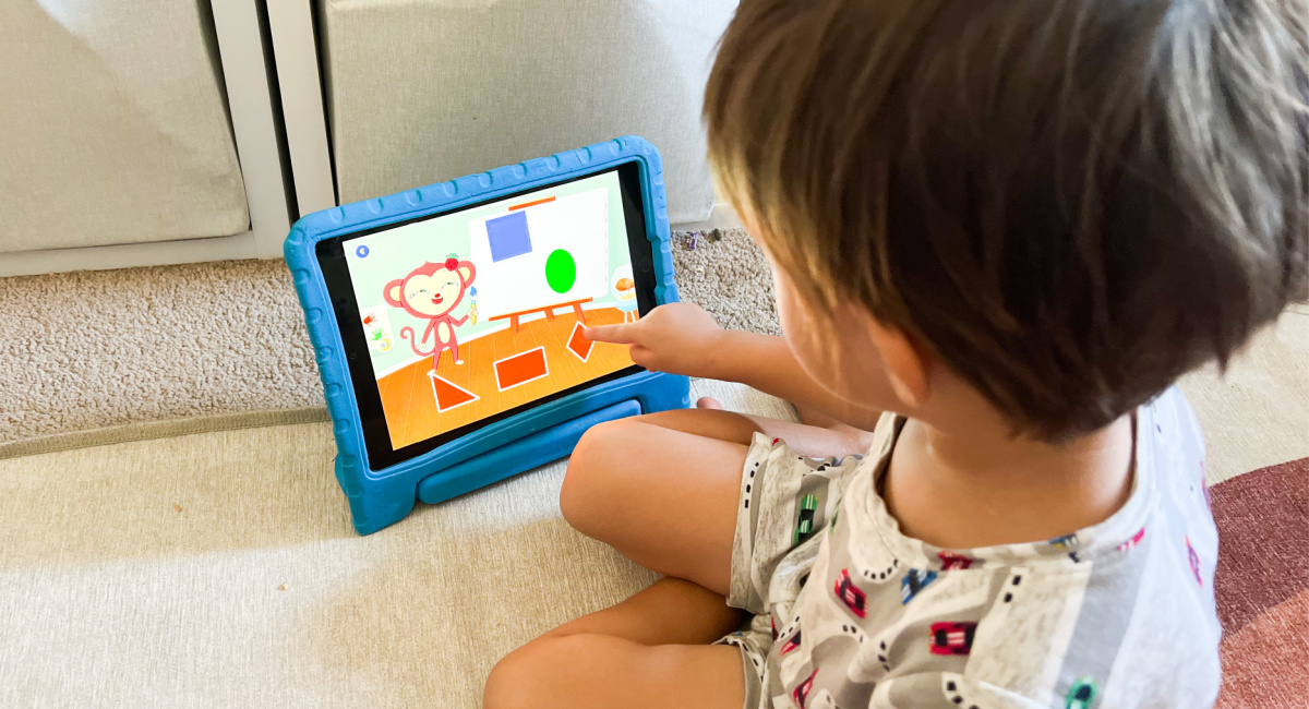 toddler playing ipad