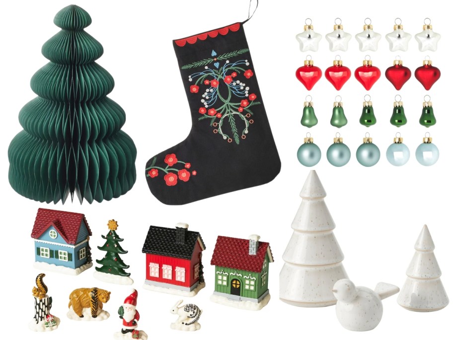 a green papercomb tree, a blue and red Christmas stocking, a set of Christmas ornaments, a small Christmas village with figures, and a set of ceramic trees with a bird