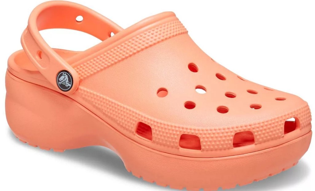 Peach colored Crocs shoes