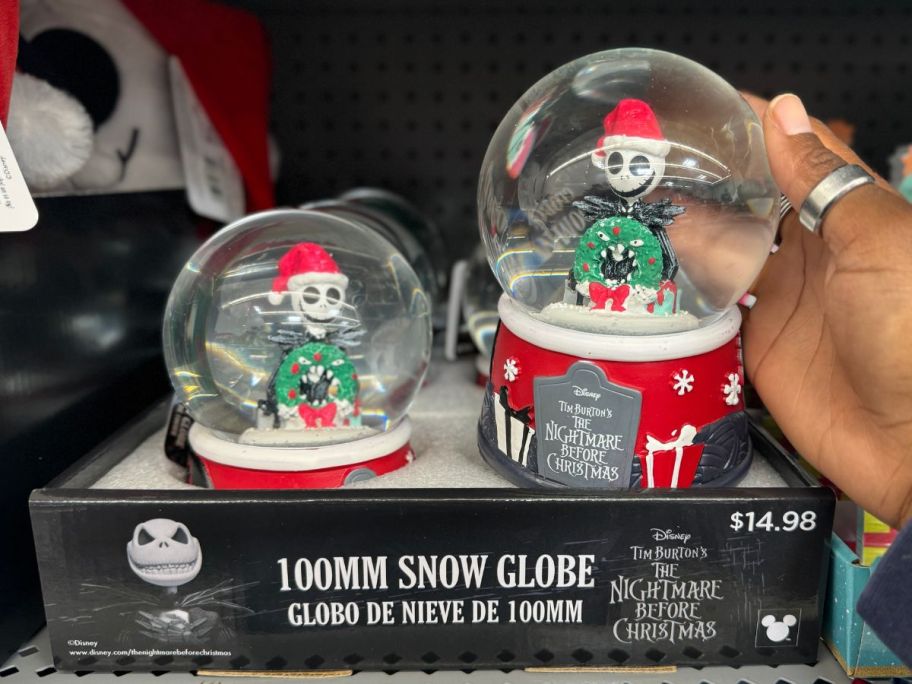 hand reaching for Disney Nightmare Before Christmas 100MM Snow Globe