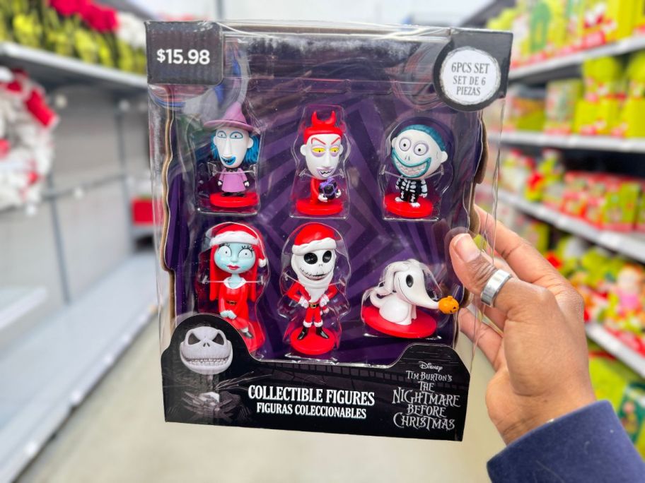 hand holding Disney Nightmare Before Christmas Collectible Figures