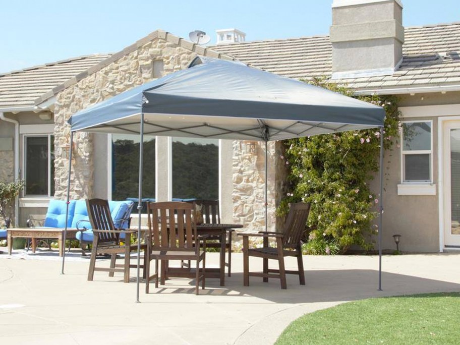 grey pop-up canopy over patio set