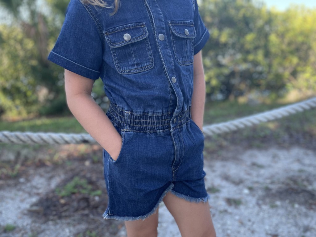 girl wearing Maurices Evsie Romper