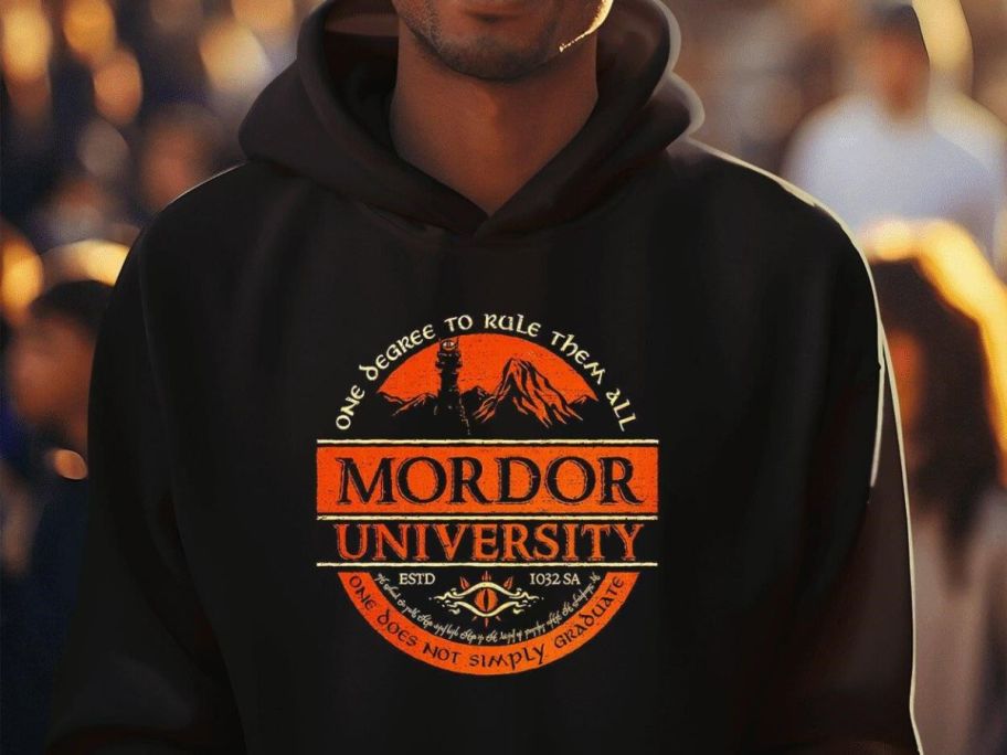 A man wearing a Woot Mordor University hoodie