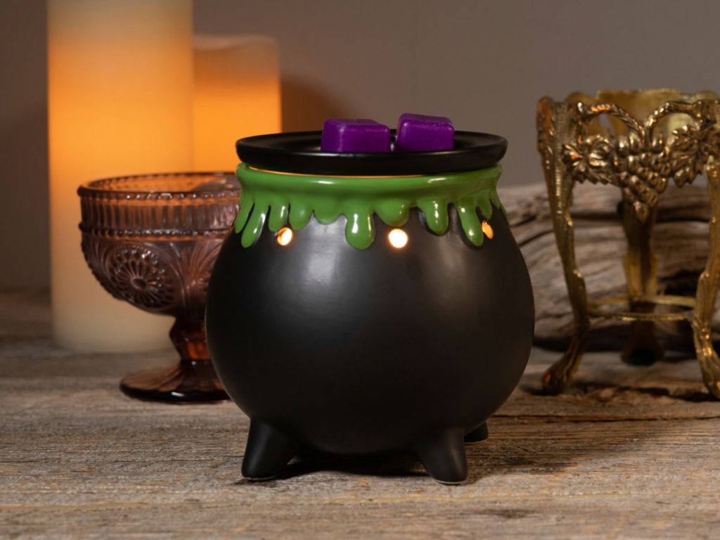 ScentSationals wax warmer couldron on table