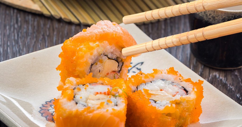 Sushi with chopsticks