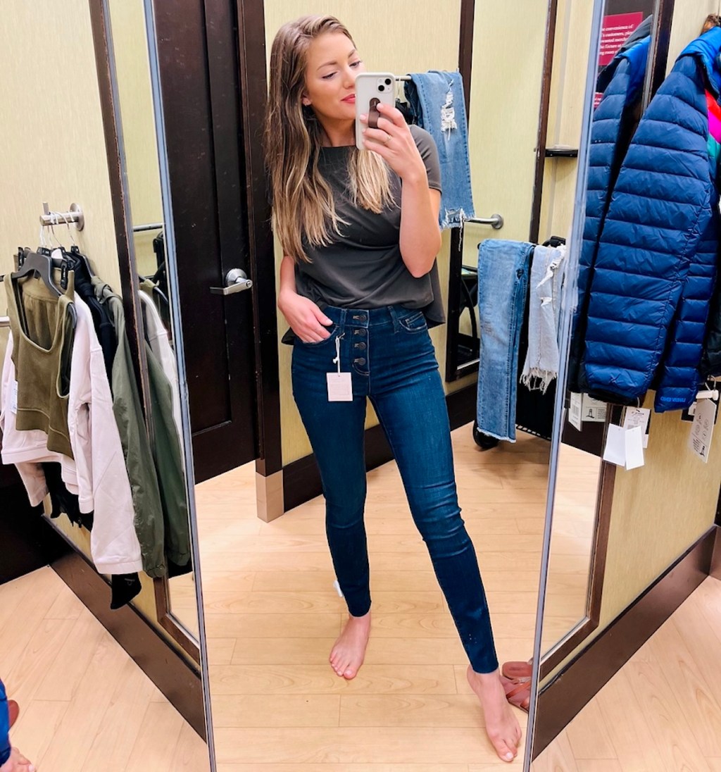 woman taking selfie in mirror at kohls