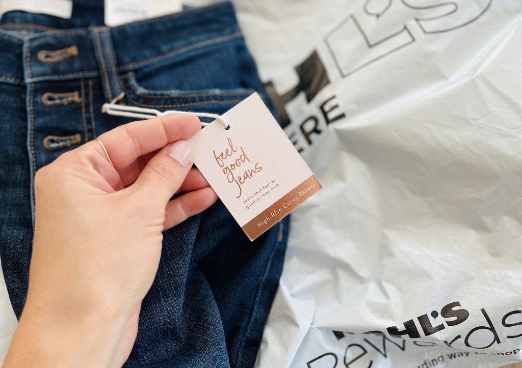 hand holding tag on lauren conrad skinny curvy jeans