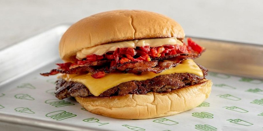 bacon cheeseburger on tray 