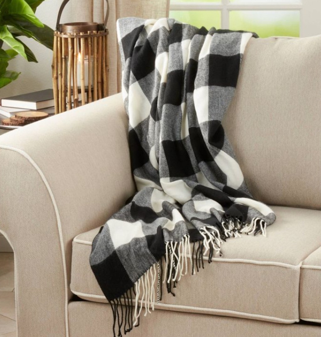 black and white buffalo plaid check draped on couch