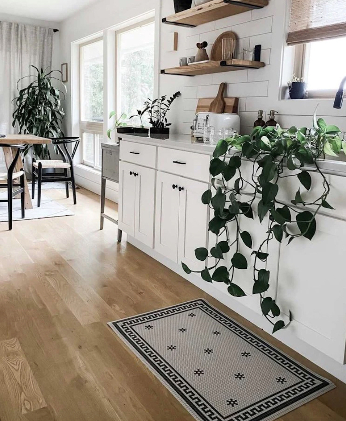 kitchen with tiled mat in front of sink