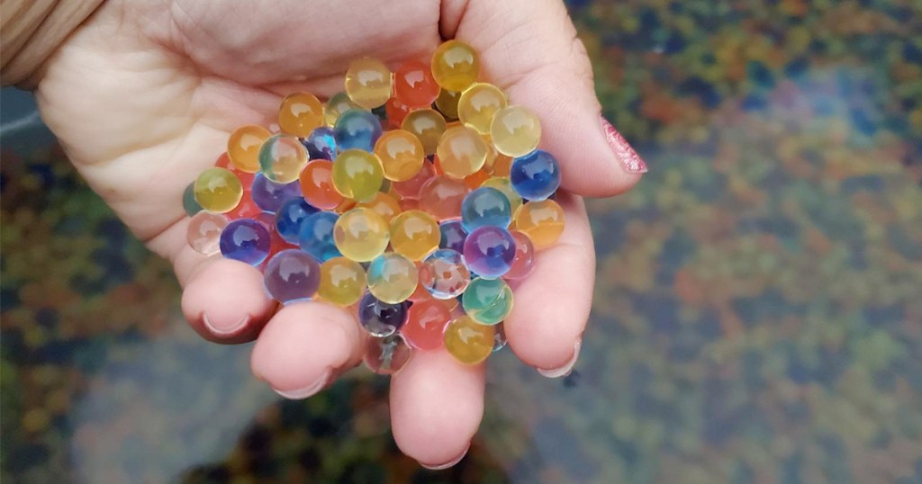 water beads in womens hand