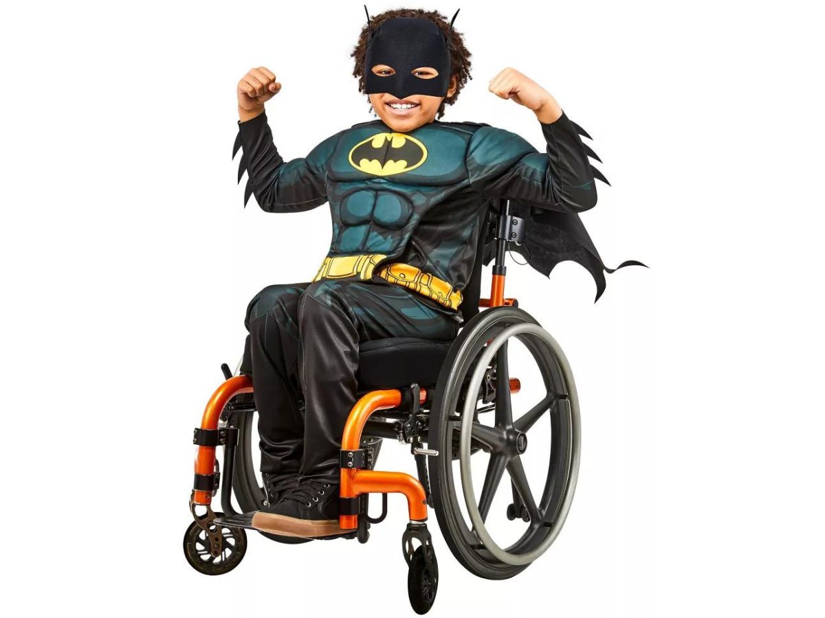 boy in Batman costume sitting in wheelchair