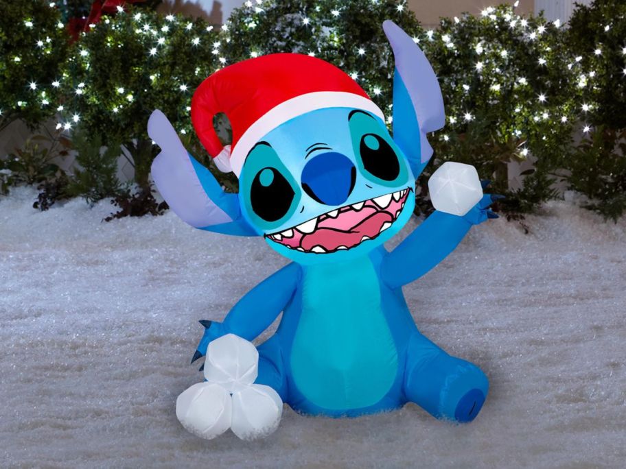 Disney 3' LED Stitch w/ Snowballs Christmas Inflatable in front of house