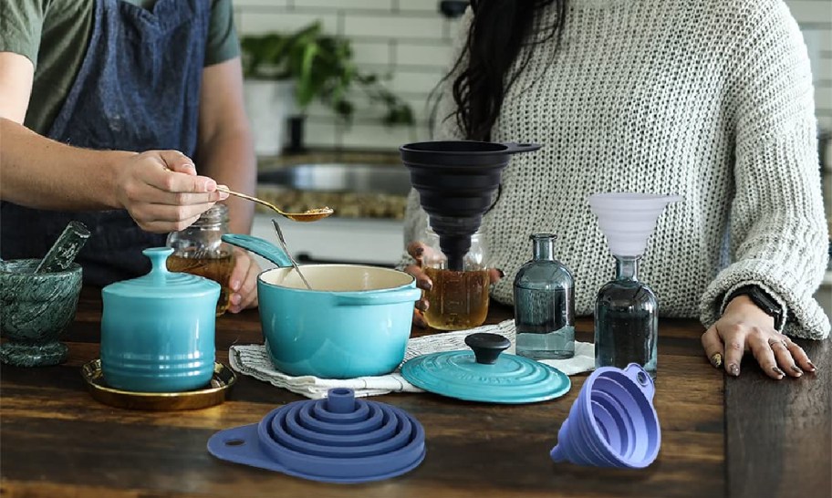 Couple using the KongNai Collapsible Funnel Set