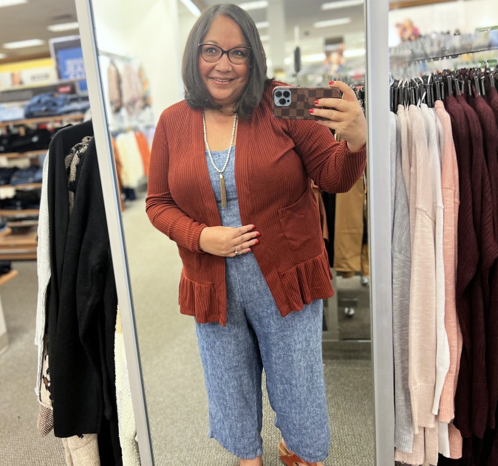 woman taking selfie in mirror at Kohl's