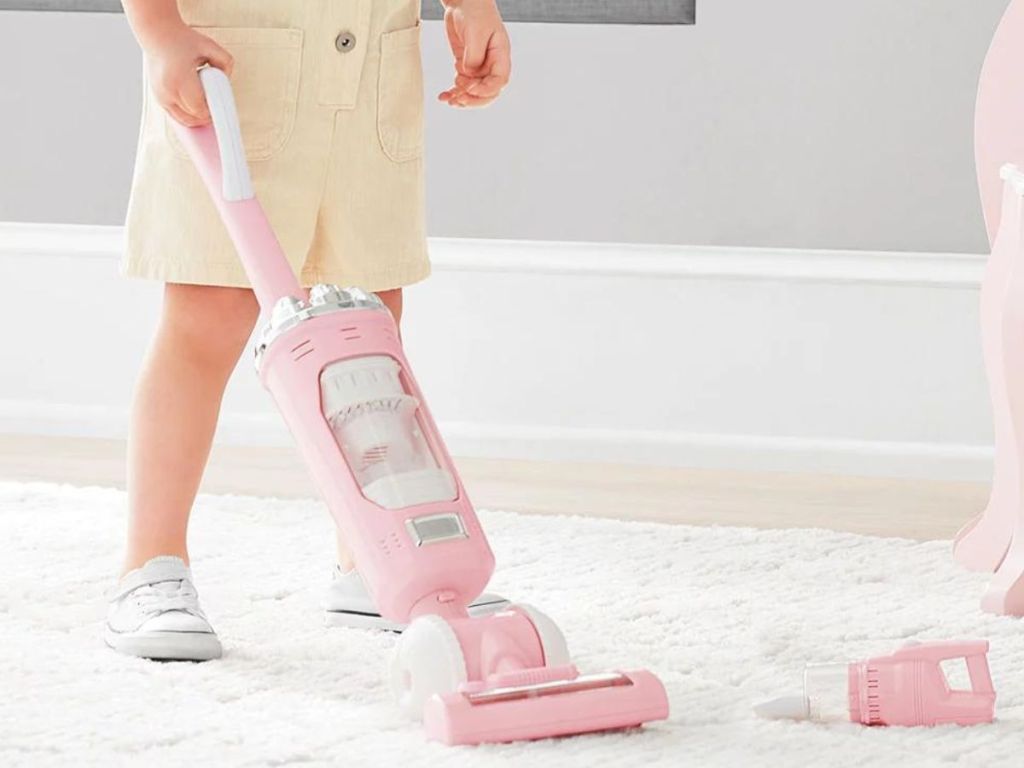 girl playing with a Member's Mark Vacuum