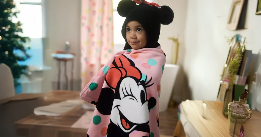 The Big One Hooded Disney Minnie Towel being worn by a child