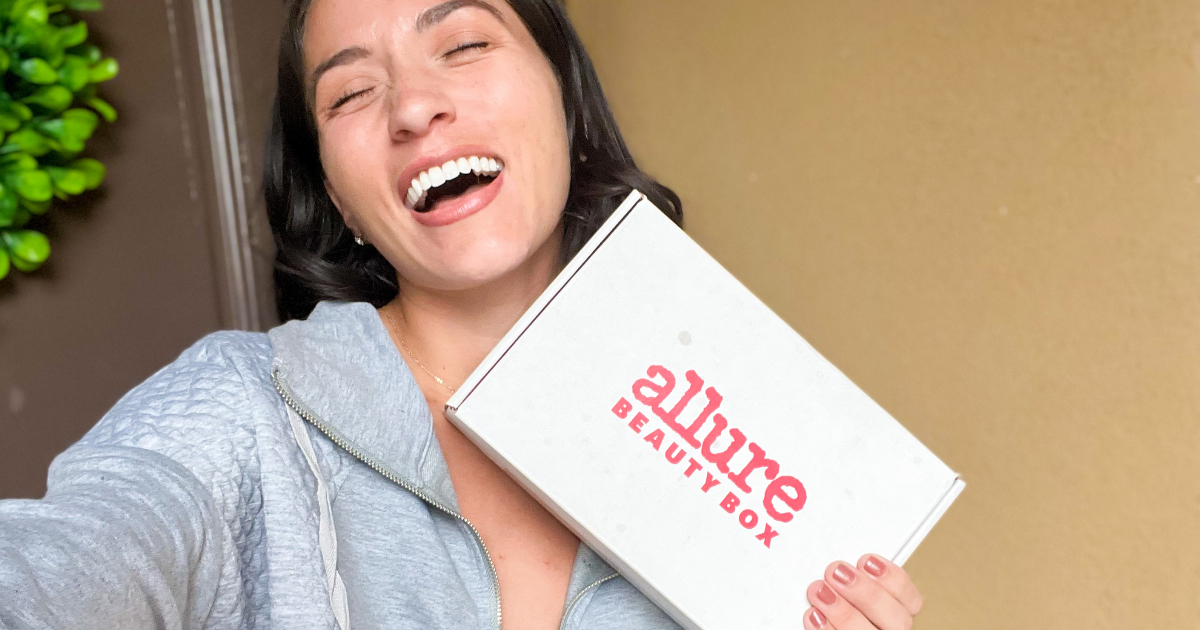 Woman holding allure box