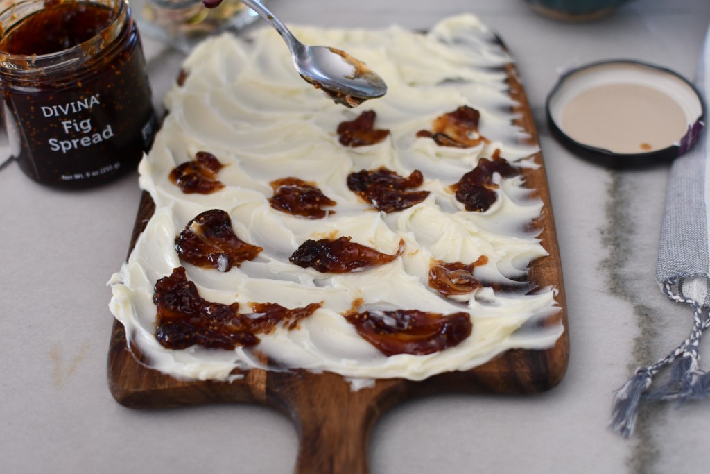 adding fig spread to butter board