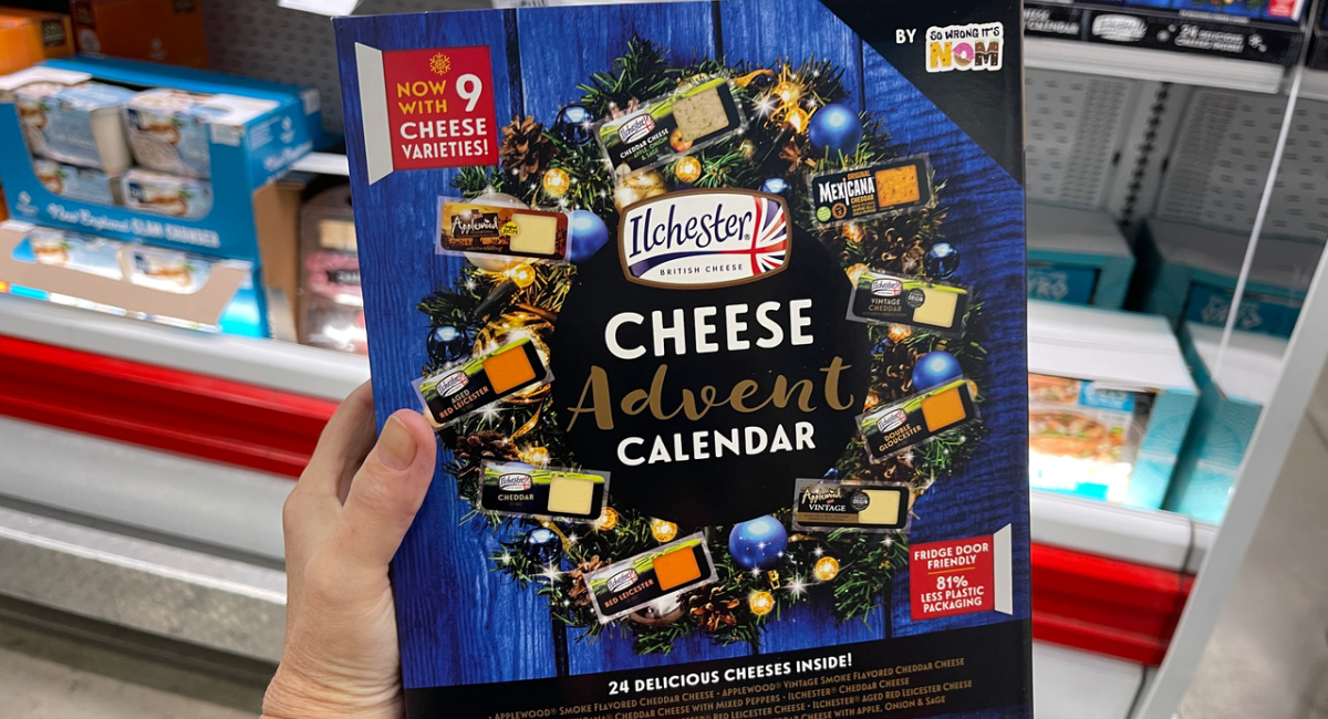 hand holding a sam's club cheese advent calendar in store
