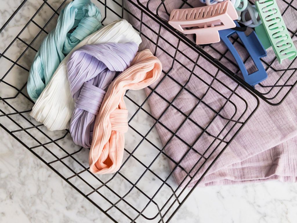 black wire baskets holding hair accessories