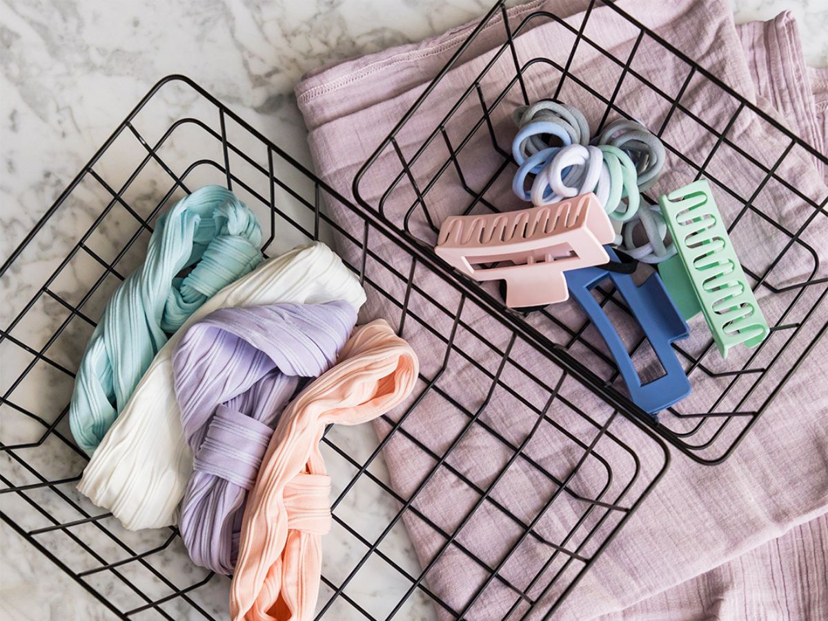 black wire baskets holding hair accessories