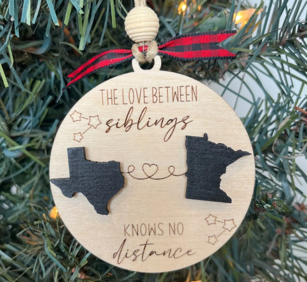 siblings wooden ornament on tree