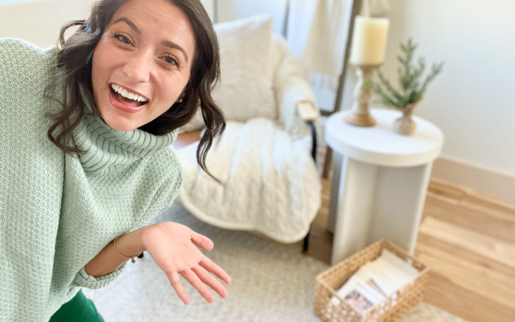 woman pointing at chair