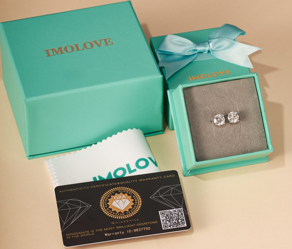 18K Earrings in teal box