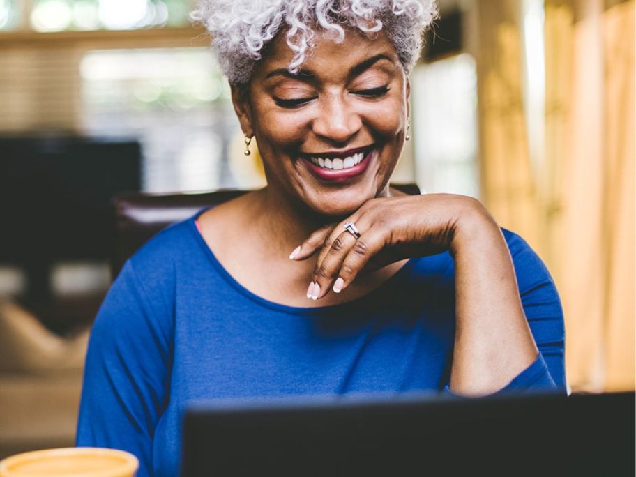 woman looking at a computer