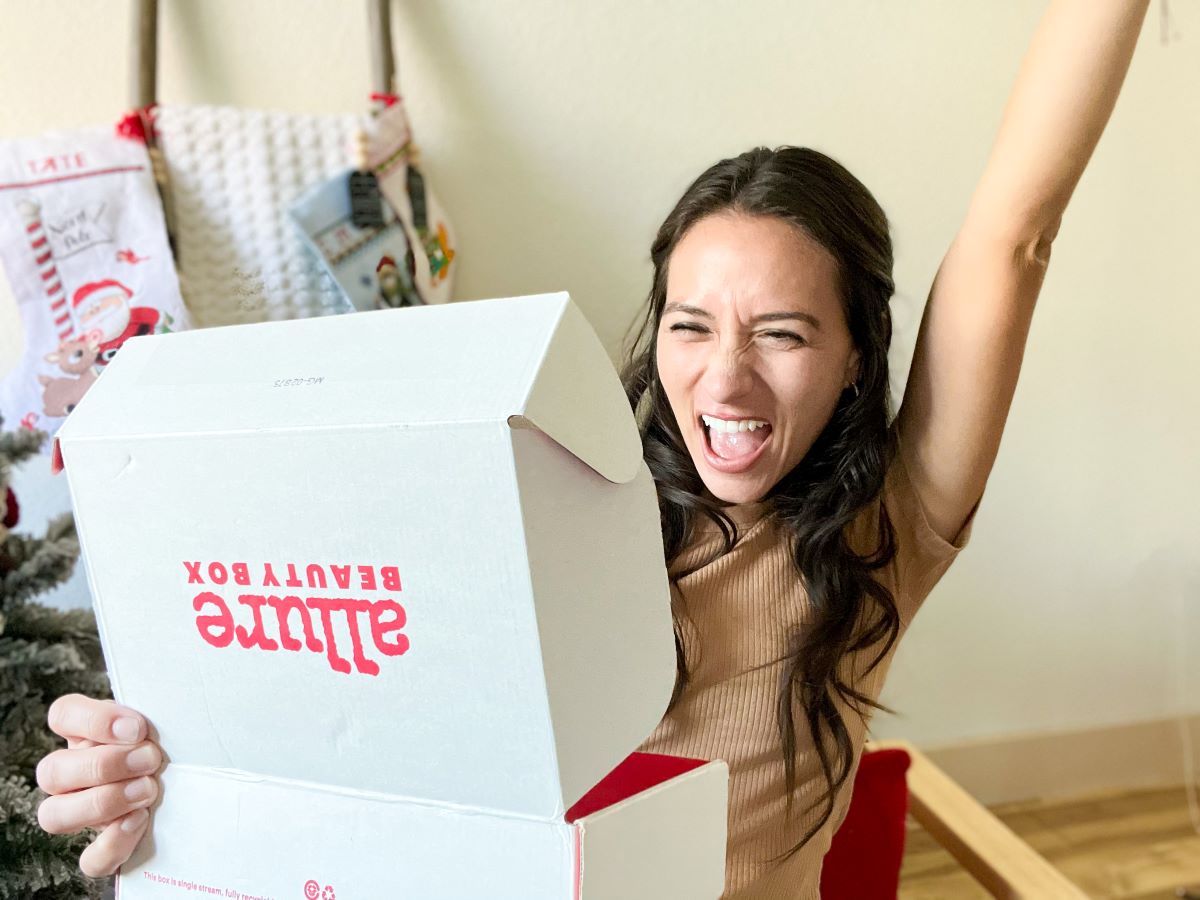woman looking at an Allure Beauty Box